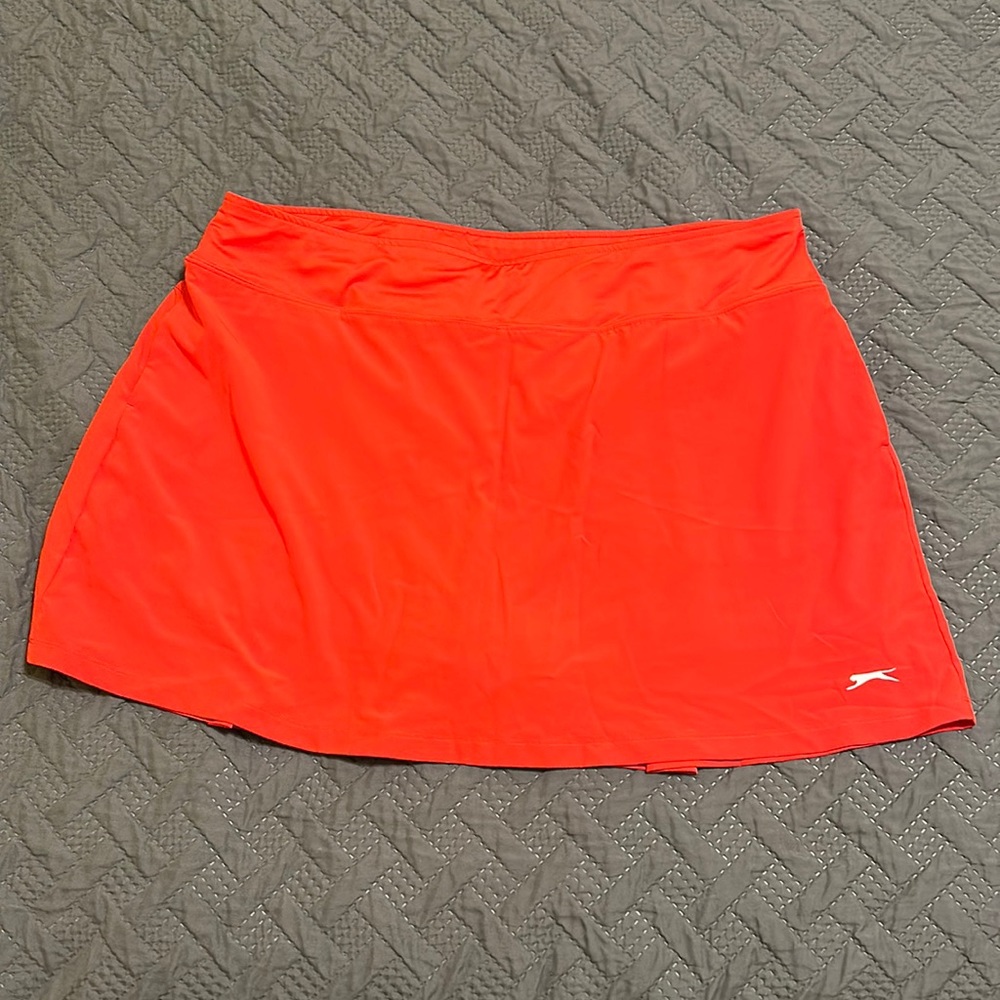 Slazenger Bright red golf skirt with shorts underneath.